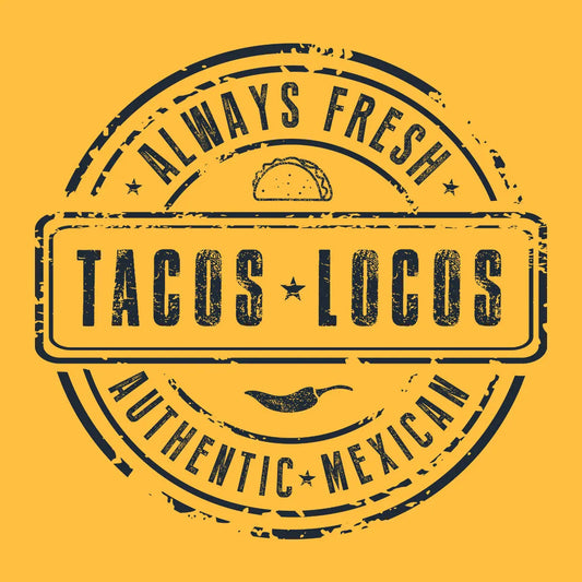 Close-up of yellow t-shirt with vintage 'Tacos Locos' text and design