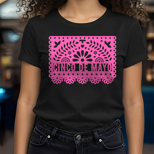 Person wearing a black t-shirt with pink 'Cinco de Mayo' design.