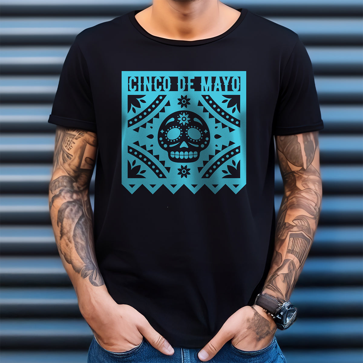 Person wearing a black t-shirt with a blue 'Cinco de Mayo' design.