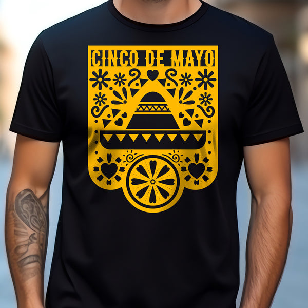 Black t-shirt with yellow Cinco de Mayo design on a blurred background