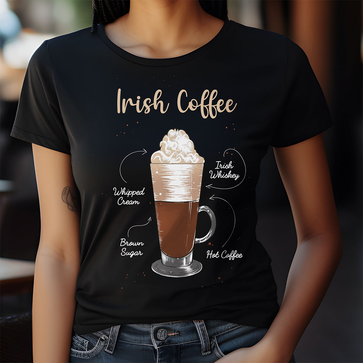 Person wearing a black t-shirt with an illustration of Irish coffee and text.