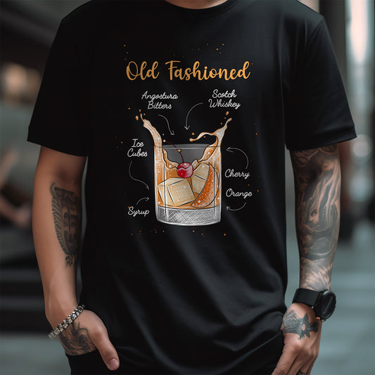 Black t-shirt with 'Old Fashioned' cocktail graphic and ingredients on a blurred background