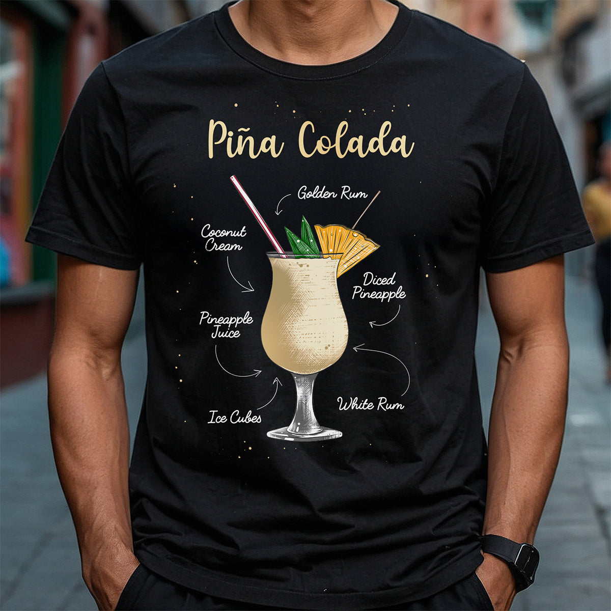 Person wearing a black t-shirt with a Pina Colada graphic and text.