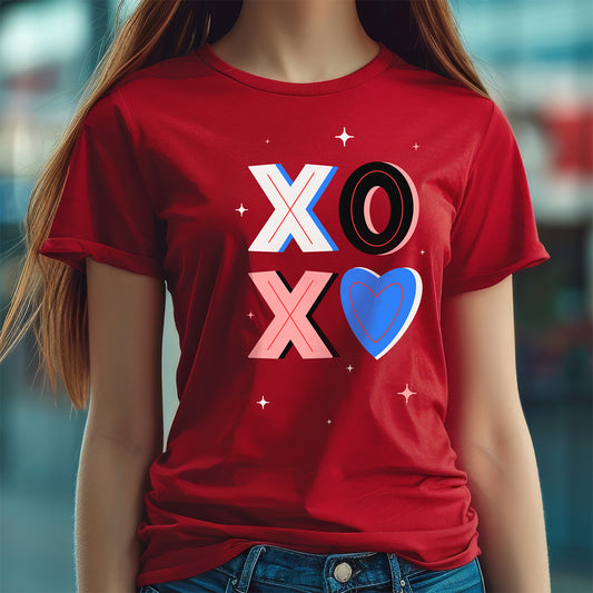 Person wearing a red t-shirt with 'XOXO' and heart design.