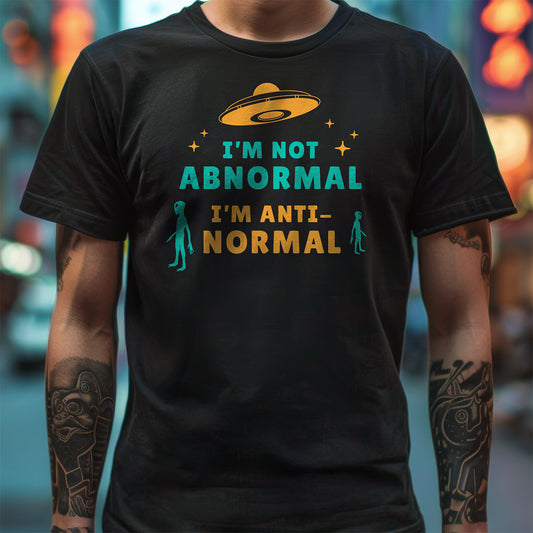 Black t-shirt with a illustrated alien design and humorous text "I'm Not Abnormal I'm Anti-Normal"