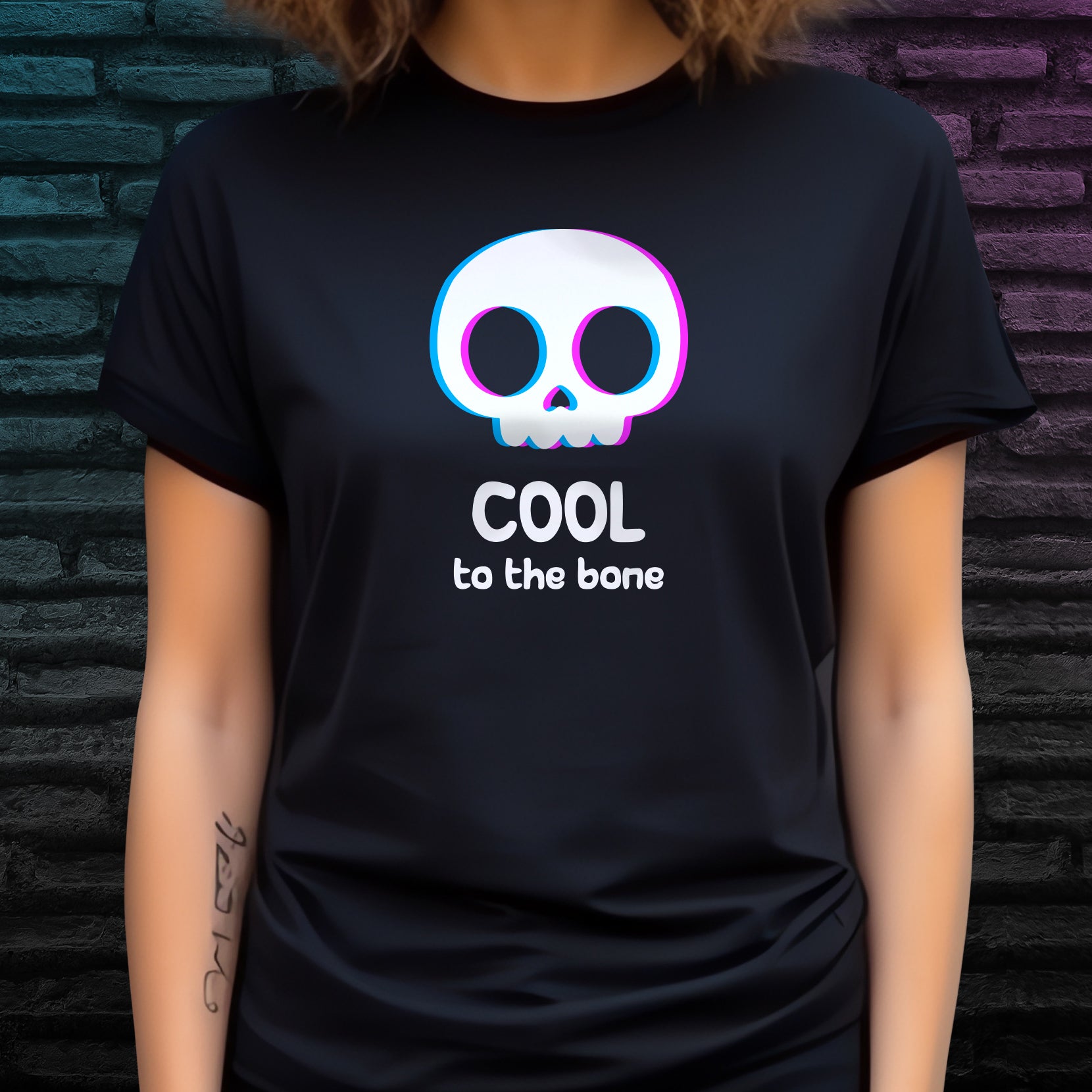 Illustrated cartoon skull design and 'Cool to the bone' text on black t-shirt