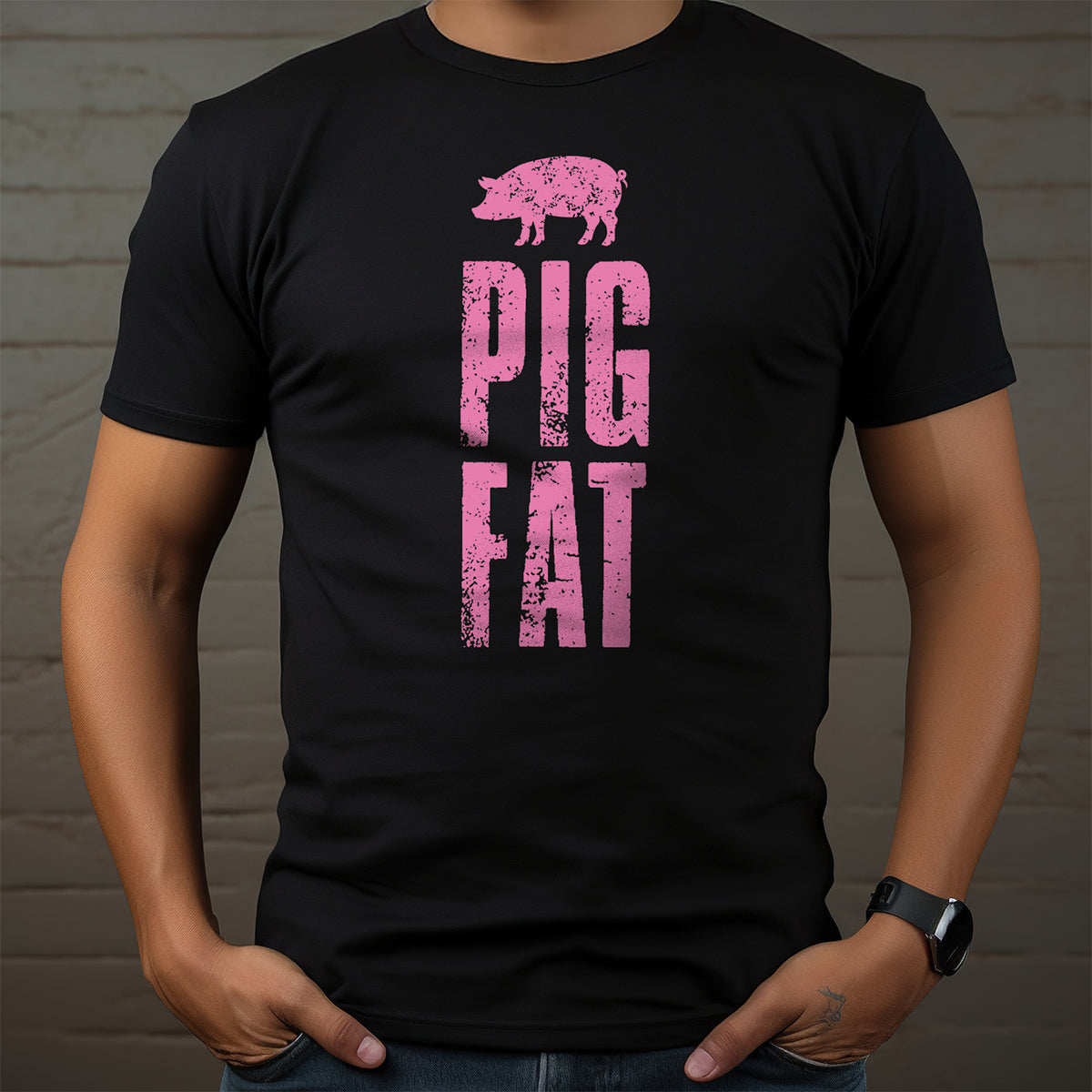 Black t-shirt with pink pig graphic and text on a person against a wooden background